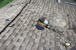 How can you tell if your roof needs repair or full replacement after a storm?