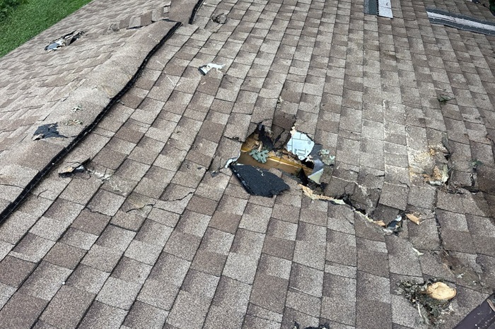 How can you tell if your roof needs repair or full replacement after a storm? Image